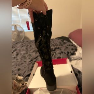 Brand new in box.  Size 8 knee high, wide calf boots.